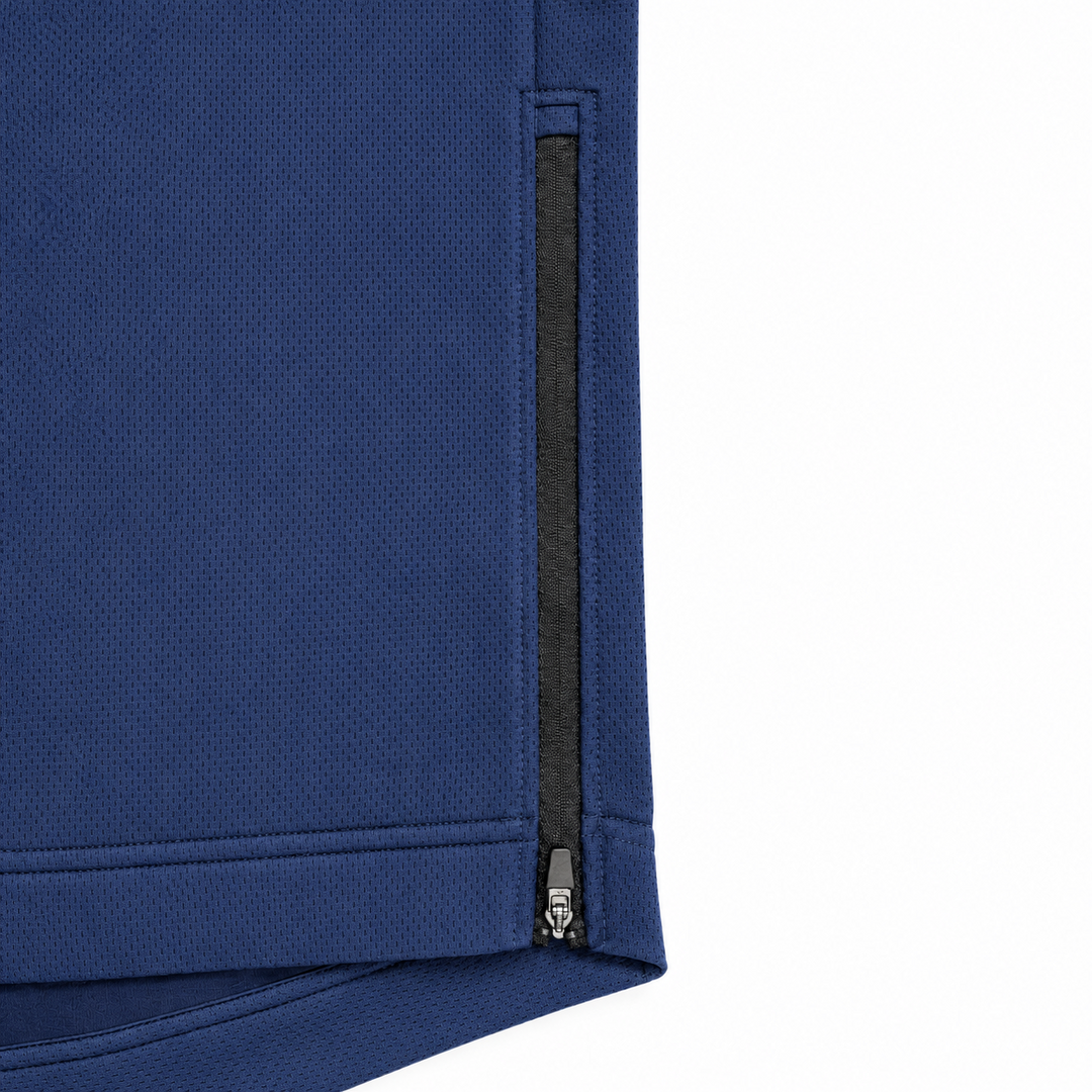 Close-up of the black side zipper on The Standard Crew in Navy