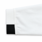 Load image into Gallery viewer, Close-up of the white sleeve and black cuff accent on The Standard Crew