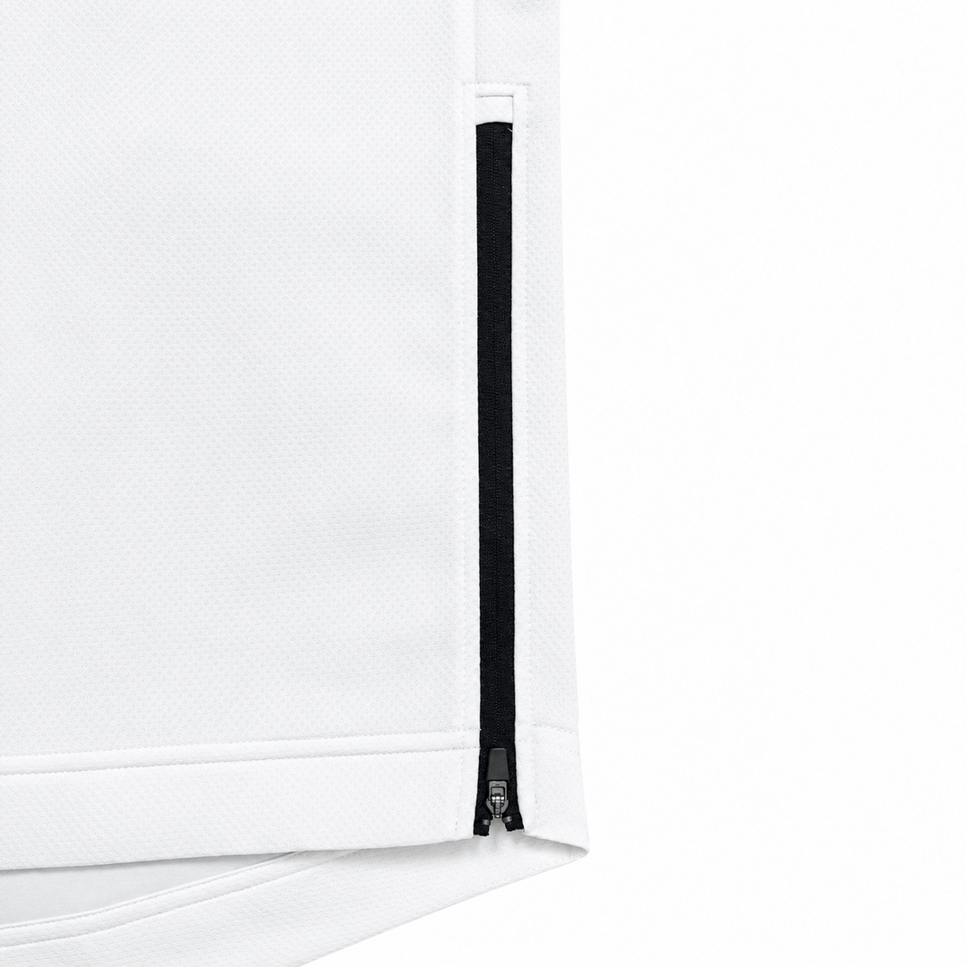 Close-up of the black side zipper on The Standard Crew in White